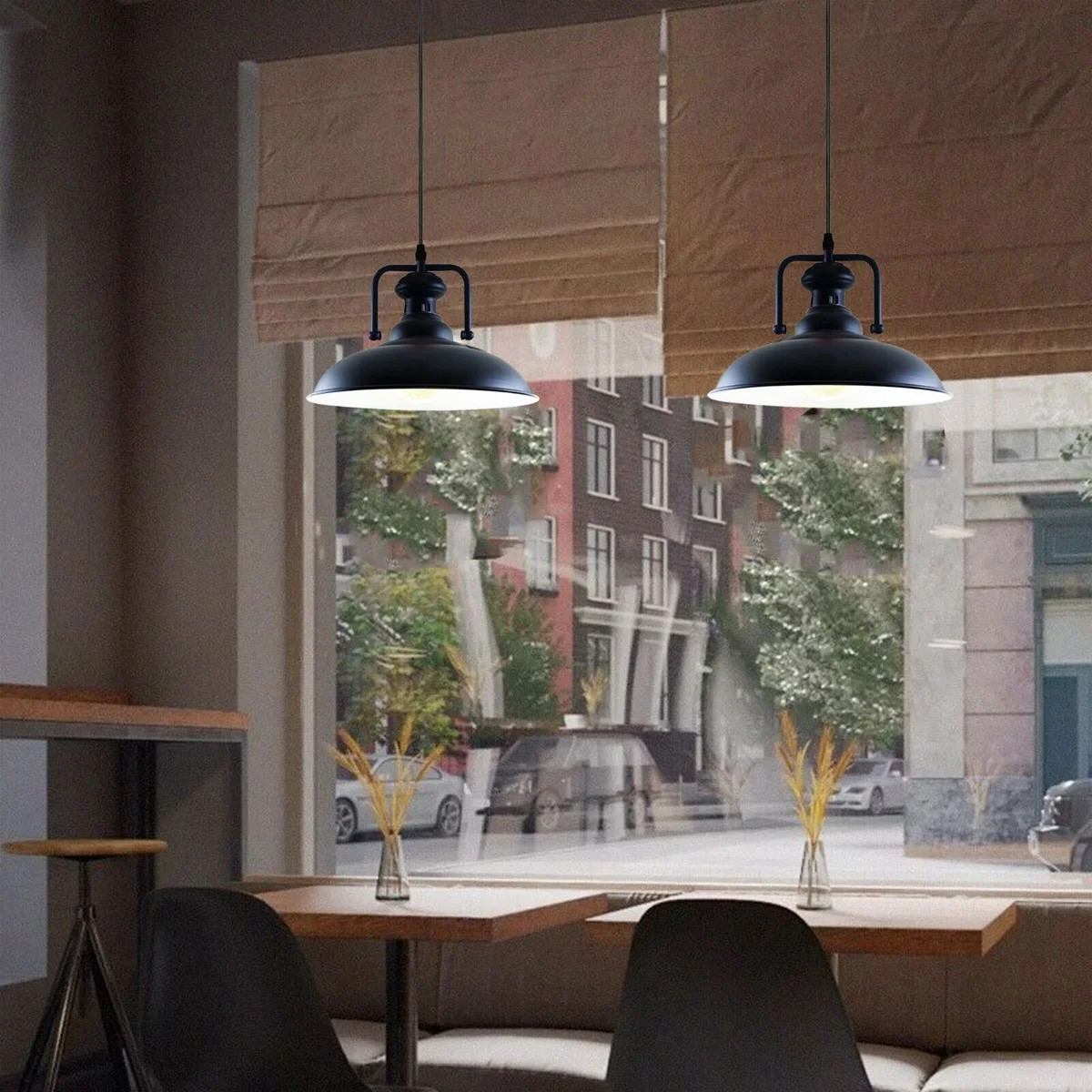 Black glossy modern metal contemporary ceiling light shade with industrial style concrete effect finish hanging indoors