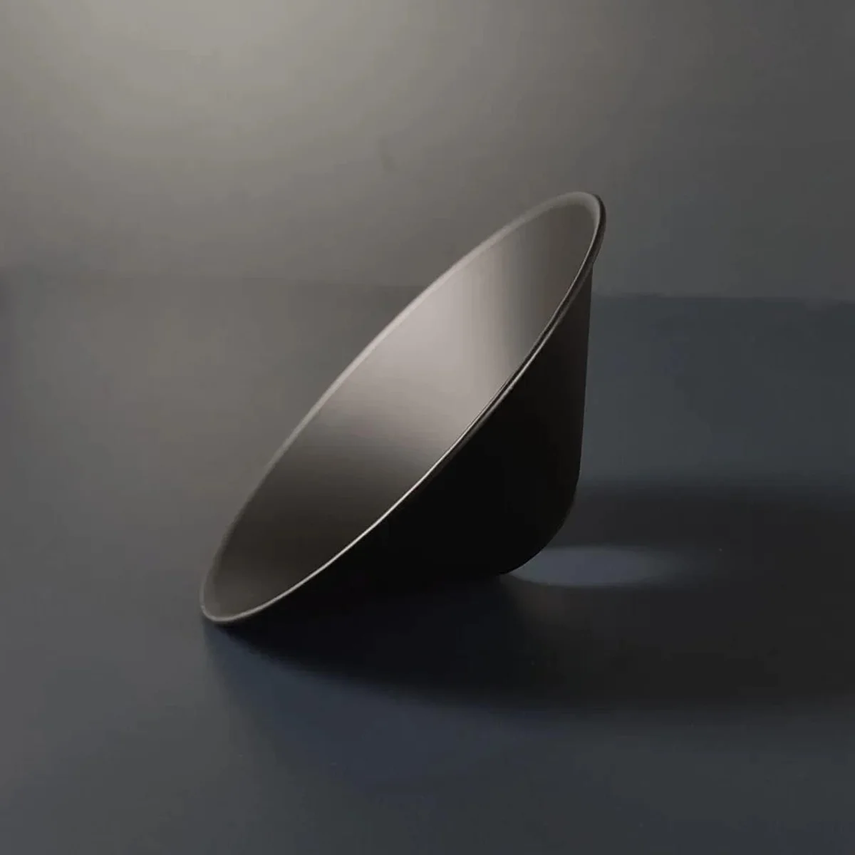 Black cone pendant light with brushed copper finish, cone-shaped metal shade, E27 fit, modern industrial style