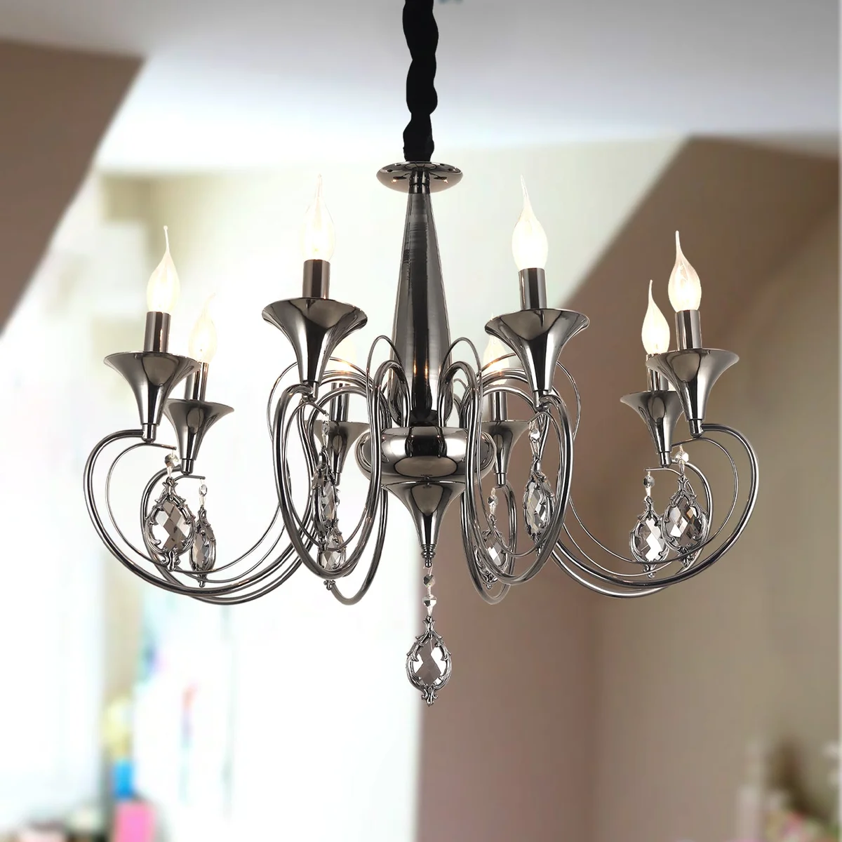 Black candle chandelier with 6 curved arms, crystal droplets, adjustable chain, and black metal finish ceiling light
