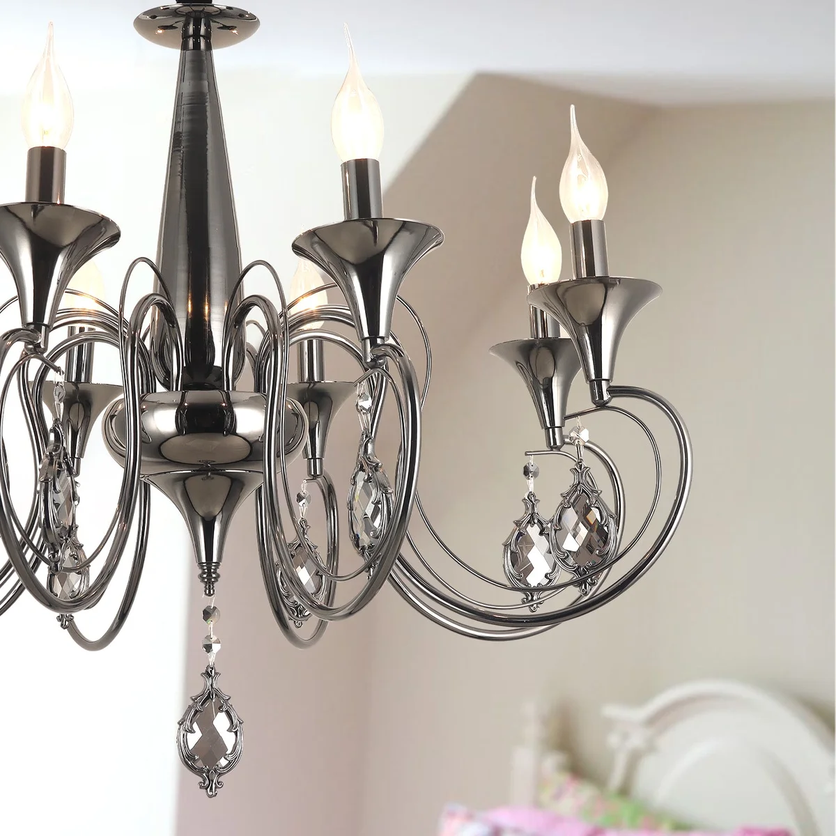 Black candle chandelier with 6 curved arms, crystal droplets, and adjustable chain, ceiling-mounted in traditional style