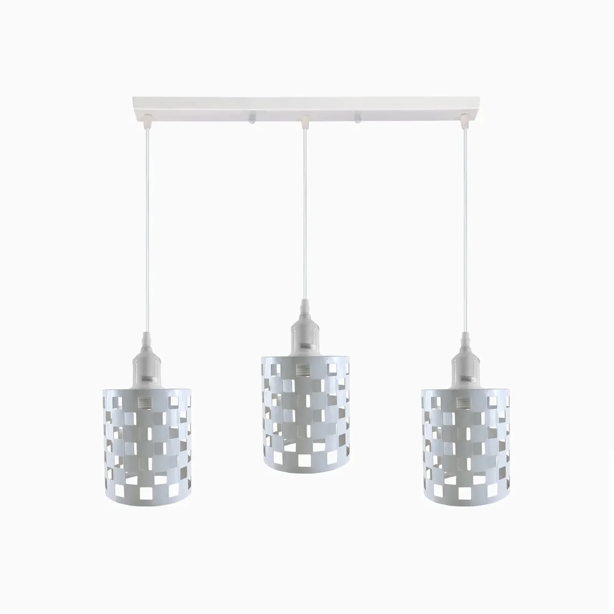 Vintage industrial pendant light with three white metal cage shades hanging from adjustable cables on ceiling mount