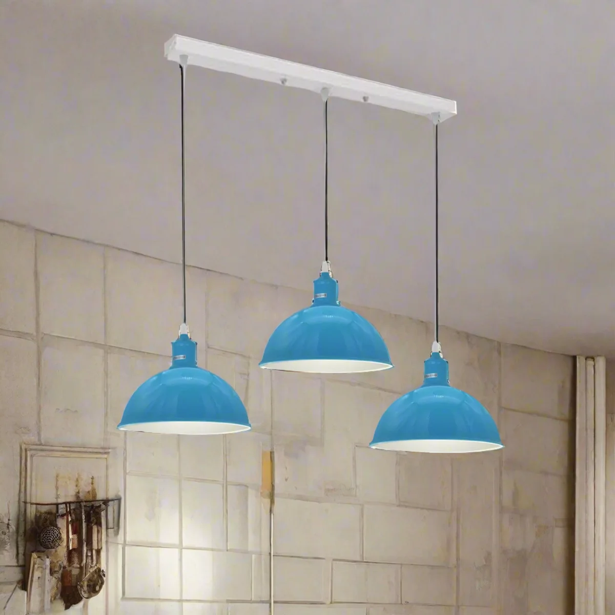 Industrial ceiling light with three metal lamp shades on adjustable cables in vintage loft style for indoor use