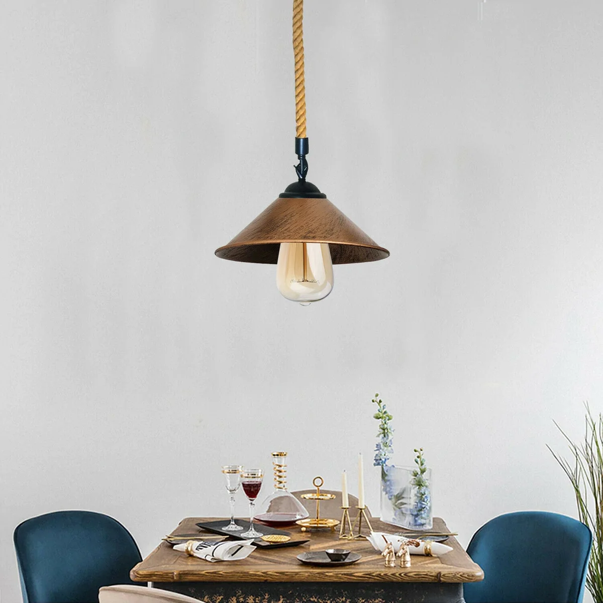 Hemp rope pendant light with brushed copper metal cage and 1m rope, ideal for warm ambient lighting in homes or cafes