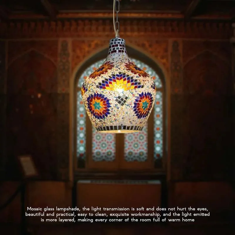 Colorful mosaic glass Moroccan pendant ceiling light with bell-shaped shade and antique brass chain hanging indoors