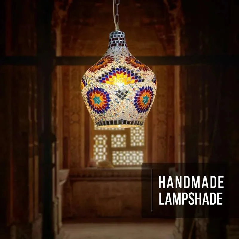 Multicolour mosaic glass Moroccan pendant ceiling light with antique brass chain and bell-shaped shade hanging indoors