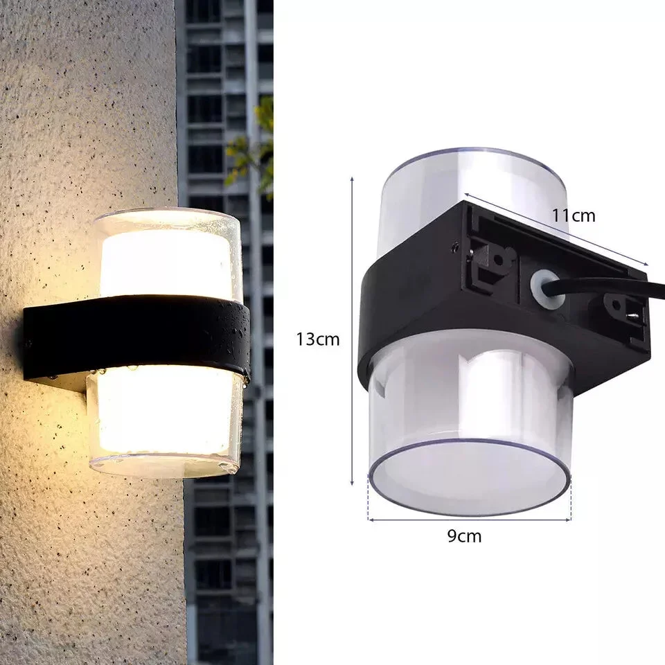 Modern black aluminum waterproof garden wall light with up and down warm white LED illumination, IP54 rated