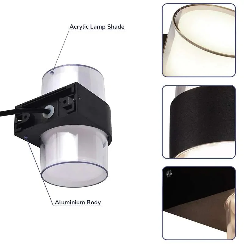 Black aluminium wall light mounted outdoors casting warm white up and down light on a textured exterior wall