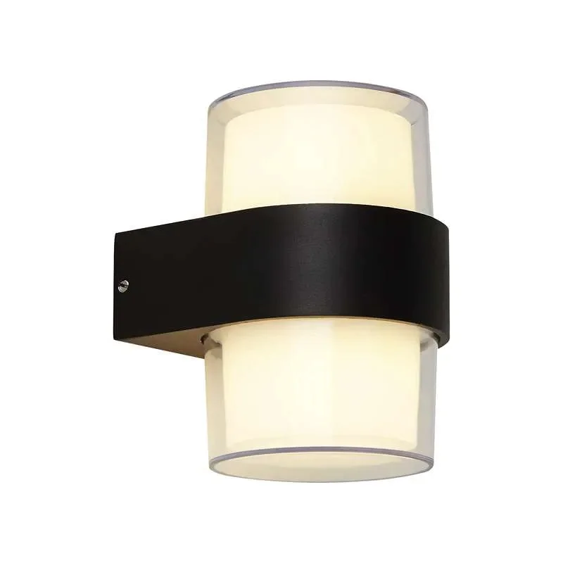 Modern black IP54 outdoor wall light with dual up and down warm white LED illumination on garden wall