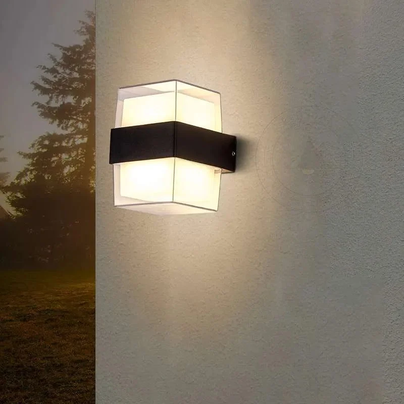 Black and white modern cuboid outdoor wall sconce with up/down warm LED light, aluminium body and acrylic shade
