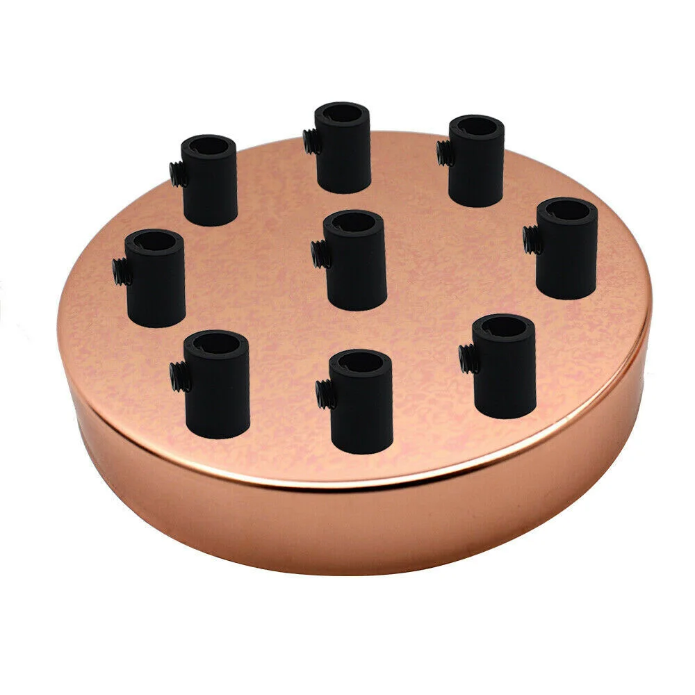 Rose gold ceiling rose with 9 outlets, round metal design, 120mm diameter, 25mm depth, includes cord grips and bracket