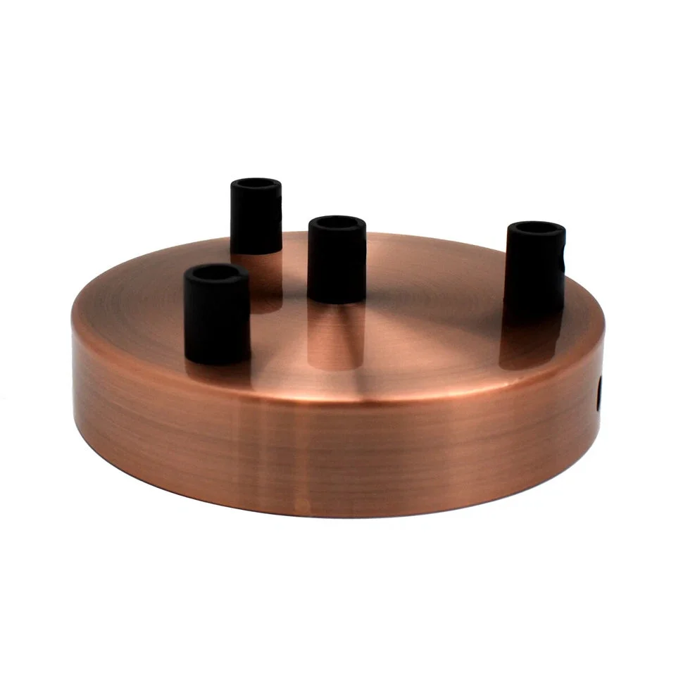Copper multi outlet ceiling rose with four side fittings and mounting accessories on a white background