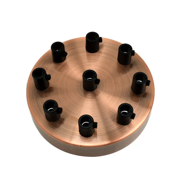 Round copper ceiling rose 100mm diameter with black drop pendant fitting and mounting hardware on white background