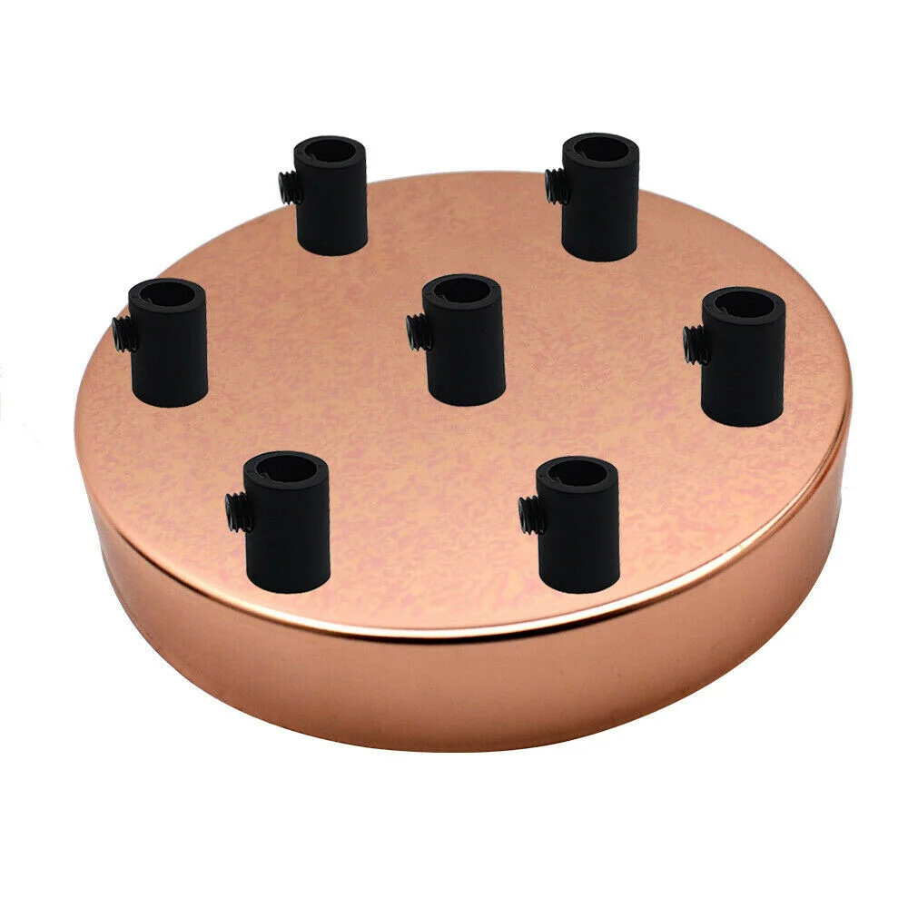 Round rose gold ceiling rose with 7 outlets, black cord grip, and metal construction, 120mm diameter, 25mm deep.