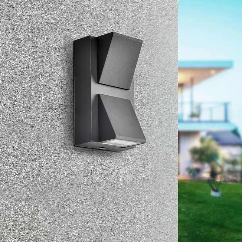 Black K shape 6W LED outdoor wall light with up and down warm white illumination, made of die-cast aluminum, IP54 rated