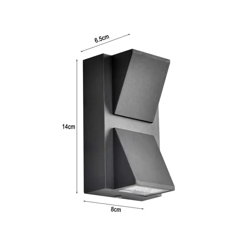 Black K-shaped 6W LED IP54 outdoor light mounted on wall showing warm white up and down illumination