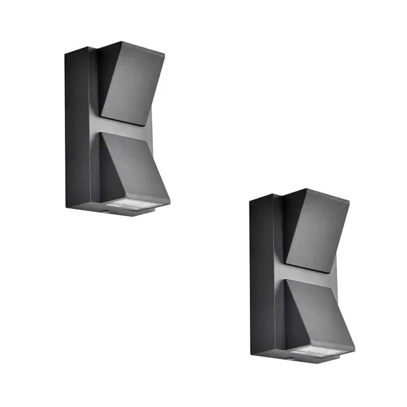 Black K-shaped outdoor wall lamp mounted on wall emitting warm white LED light with up and down illumination
