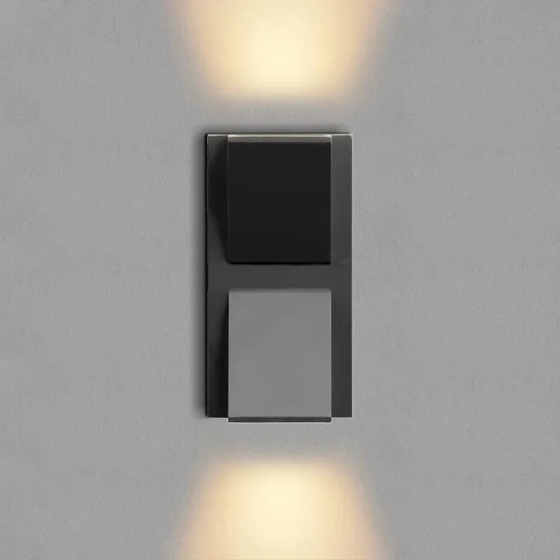 Black K shape modern outdoor wall lamp with warm white LED light, made from die-cast aluminum, IP54 rated