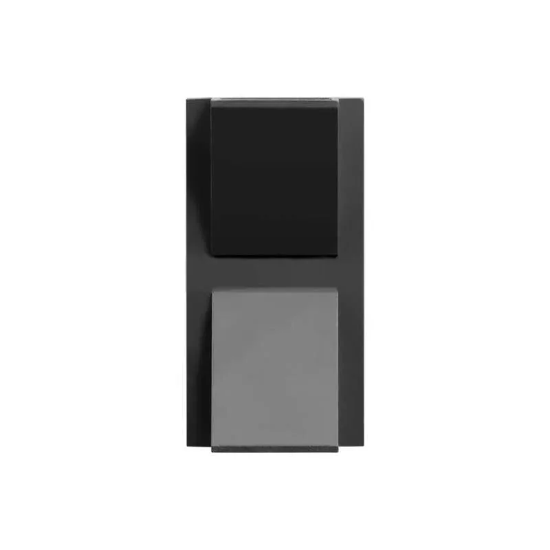Black K-shaped 6W LED outdoor wall light mounted on exterior wall, casting warm white up and down illumination