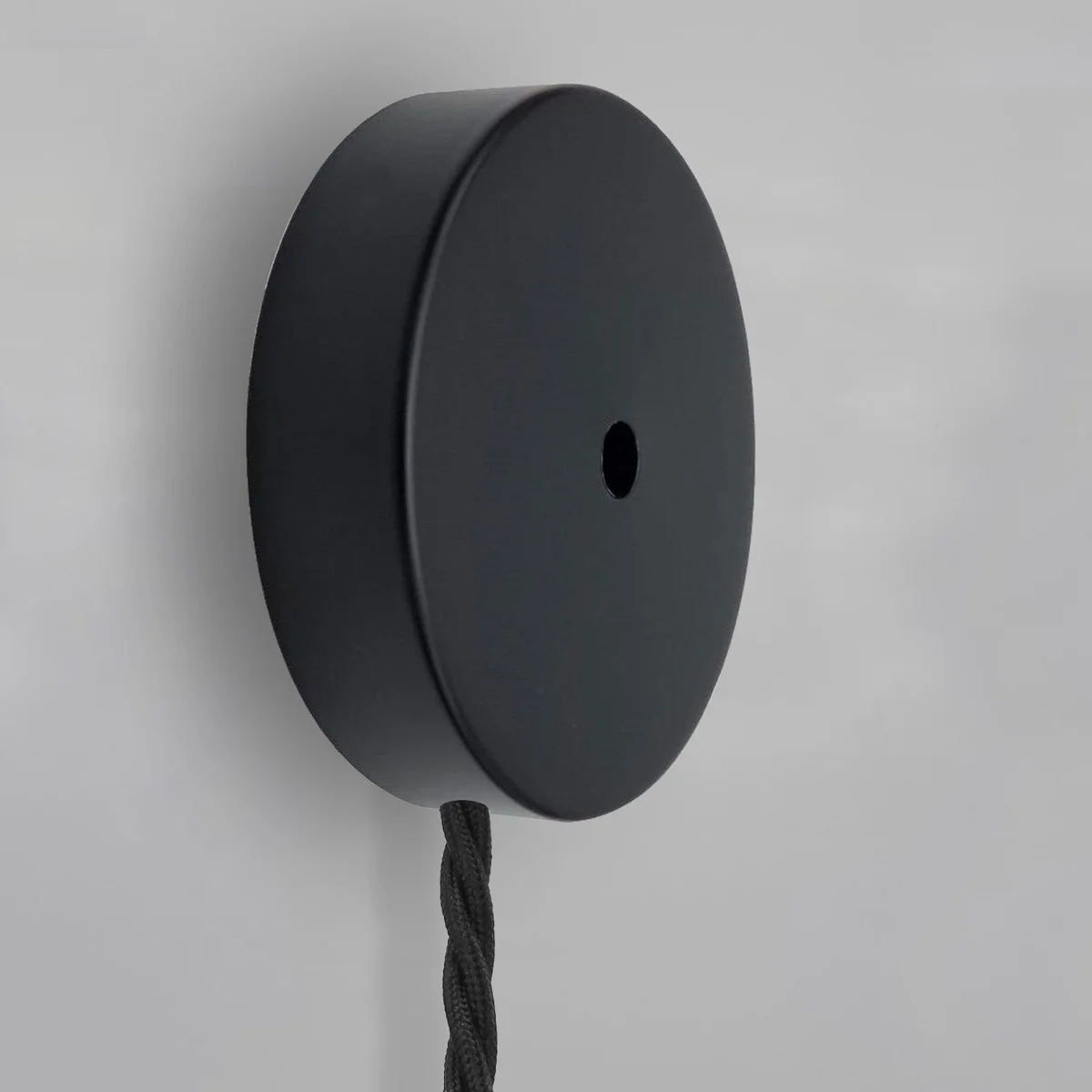 Round 100mm ceiling rose in black with side fitting hole for light fixtures and chandeliers, decorative ceiling accessory
