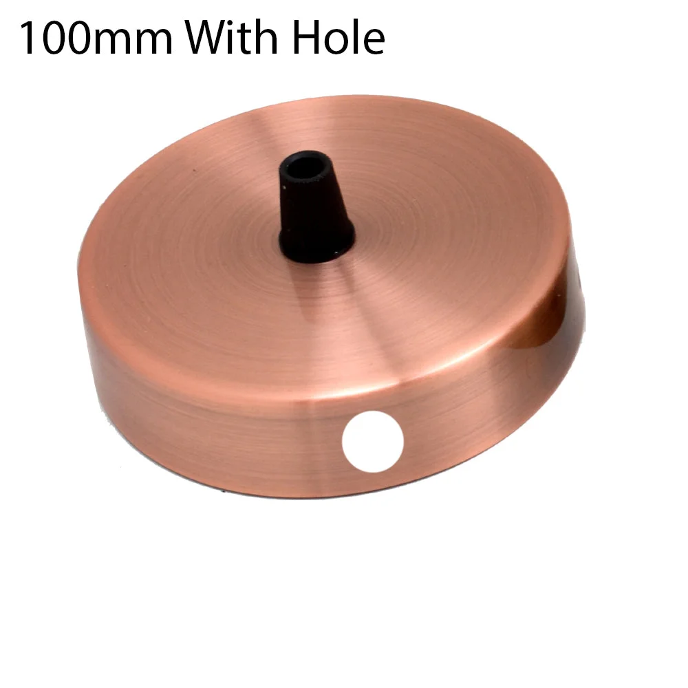 Black round side fitting ceiling rose with central hole for light fixture attachment on plain background
