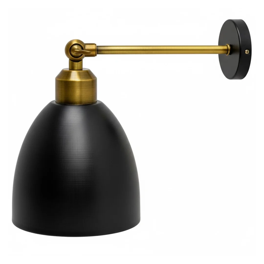 Retro wall light with antique brass metal shade, white inner hood, wall-mounted on modern interior.