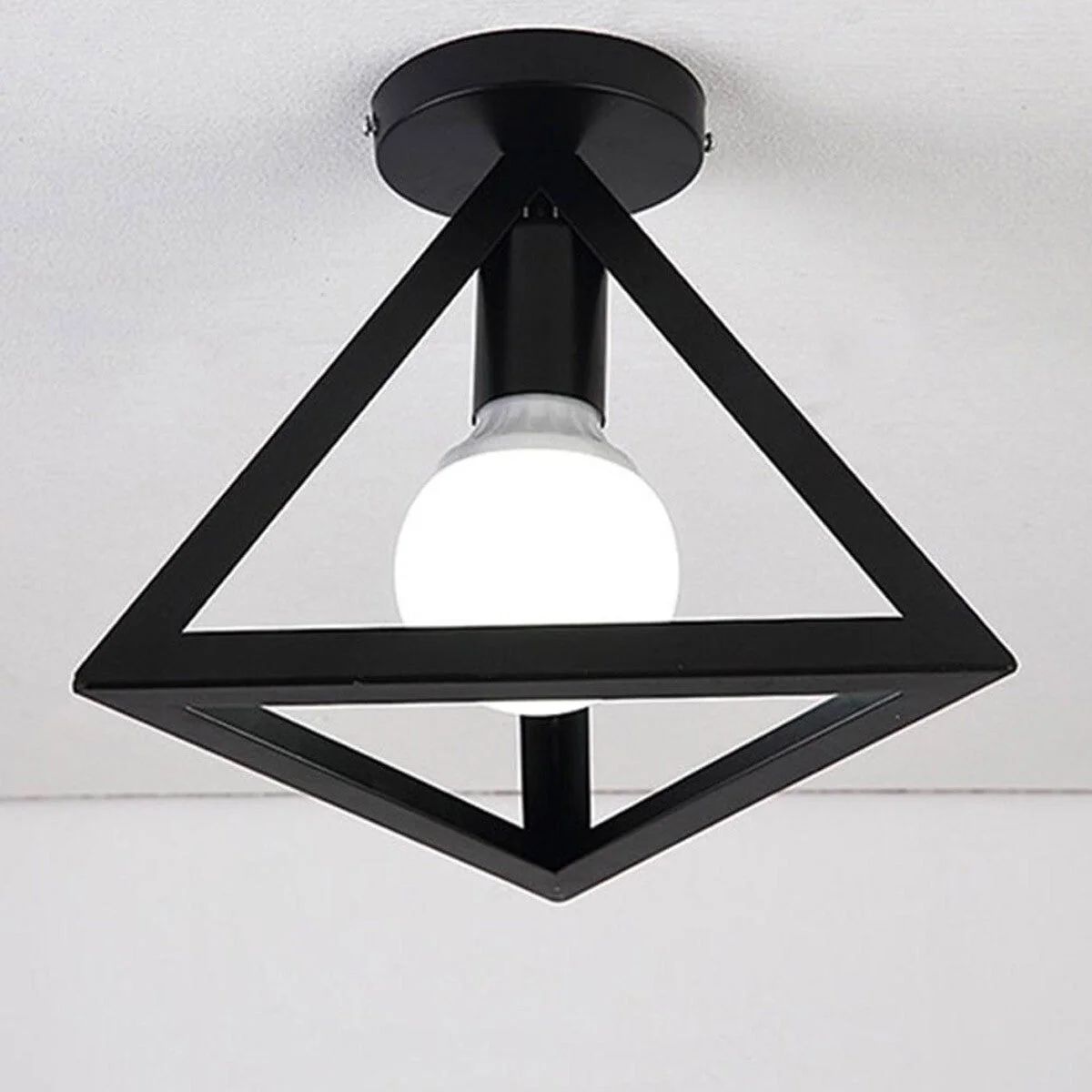Black triangle metal lampshade with wire cage design hanging from ceiling, featuring easy‑fit mounting and 4cm opening.