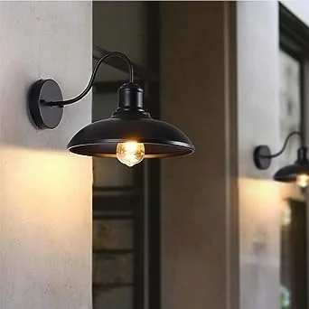 Black metal wall light with attached E27 Edison screw arm and classic metal shade.