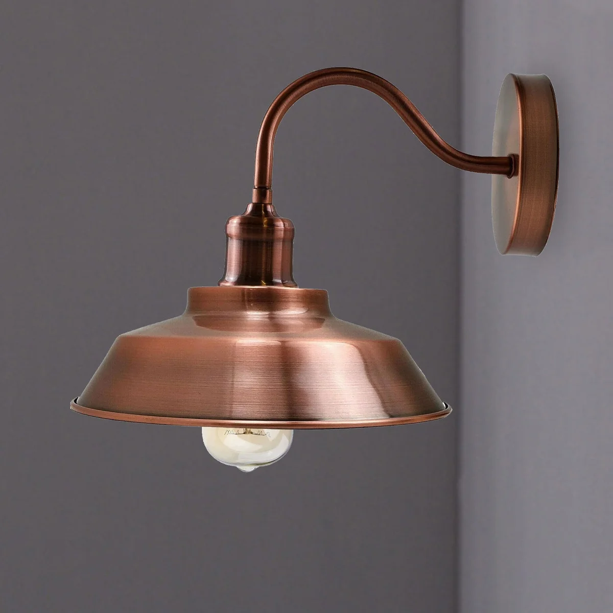 Copper wall light with matte finish, white hooded bowl, sleek modern retro design