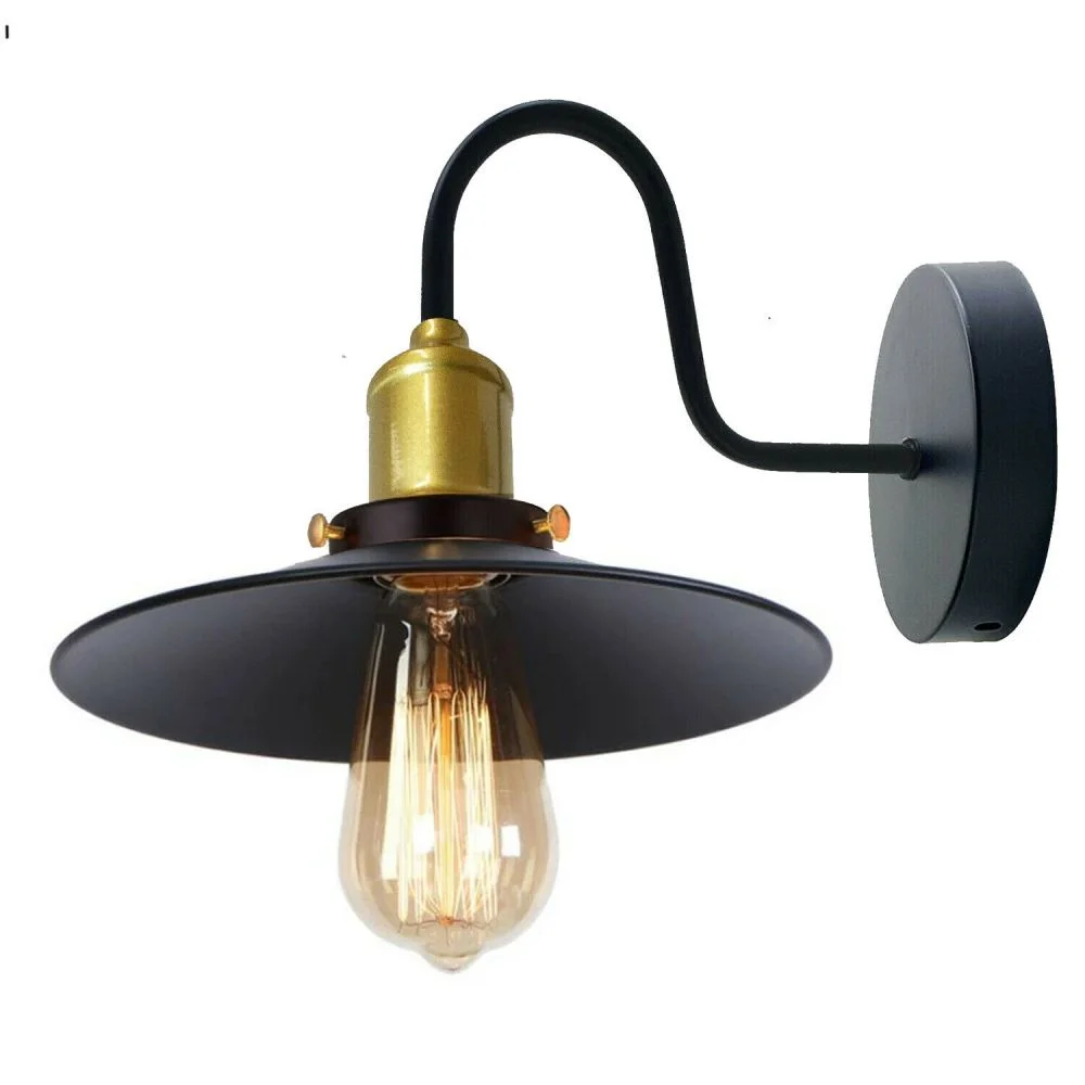 Black matte metal cone industrial wall light with gold holder, modern design.
