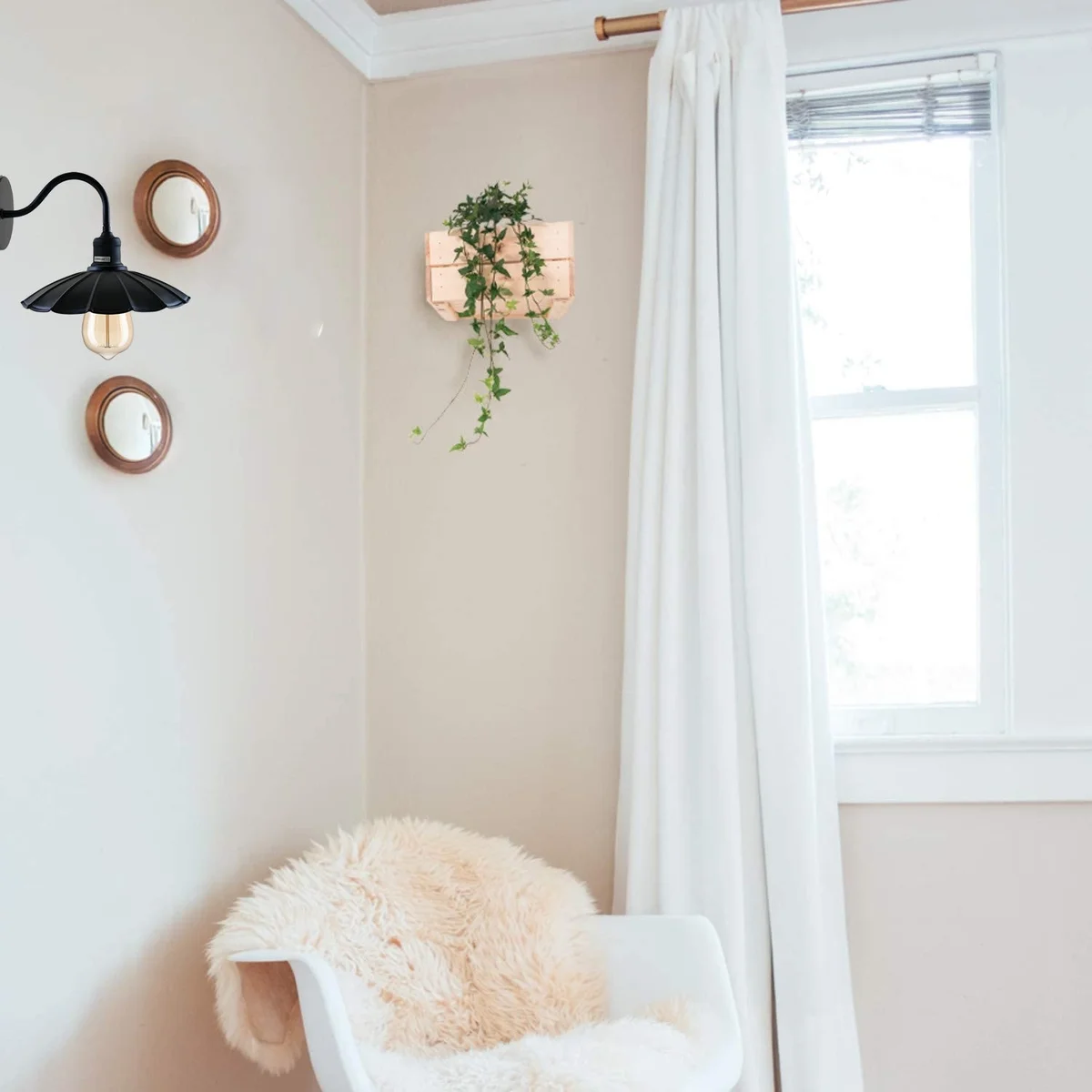 Black metal wall light with umbrella shade, mounted on wall, showing lamp holder arm and metal lampshade.