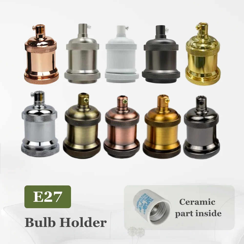 Vintage metal lamp socket with E27 screw, industrial metallic finish.