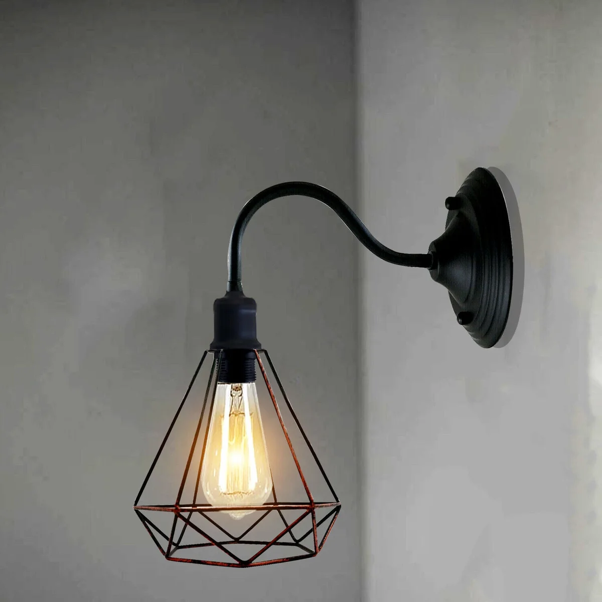 Vintage industrial wall light – metal diamond‑shaped rustic red lamp with glass lamp holder, mounted on wall.
