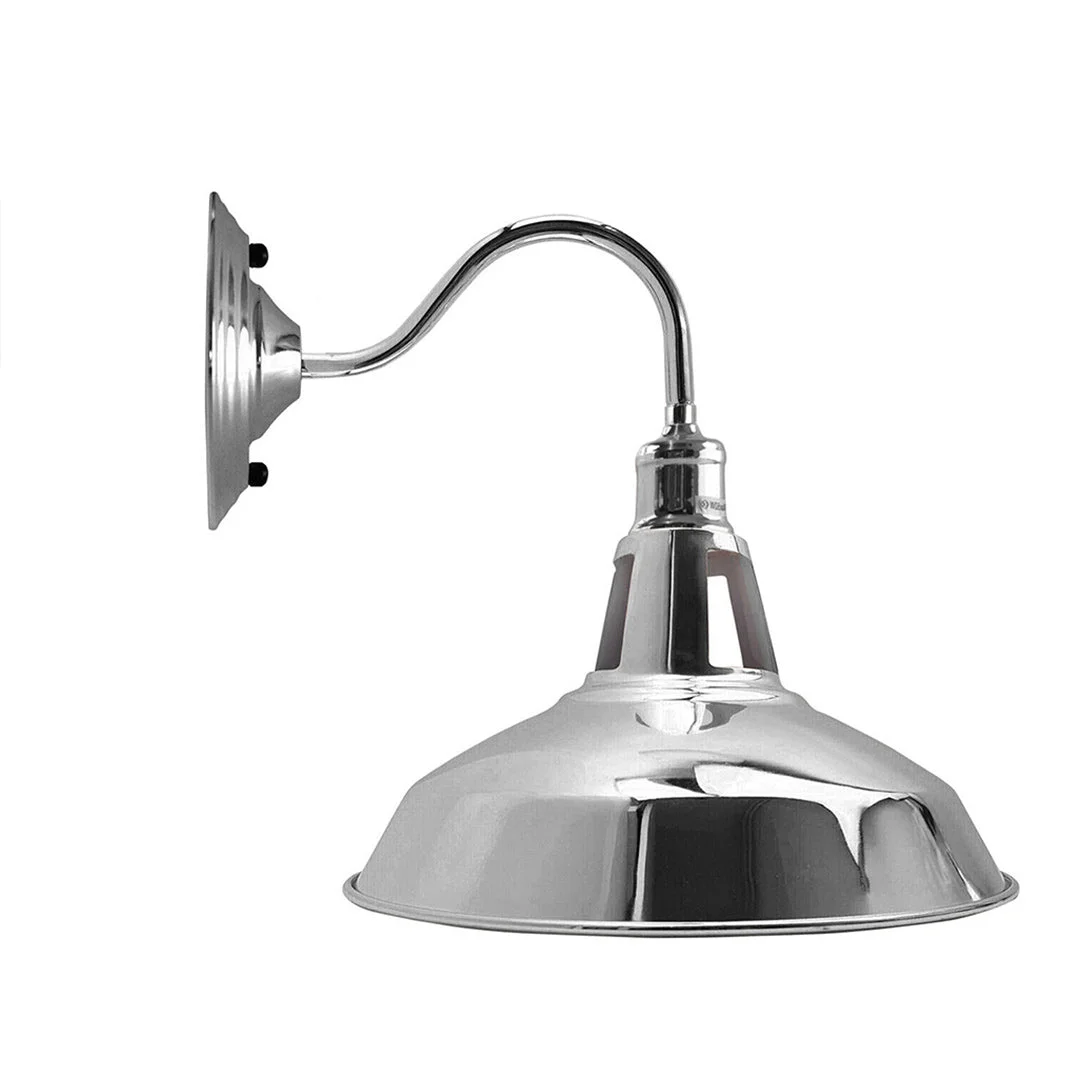 Industrial wall light with thickened metal barn‑shaped shade, black chrome or rose gold options, mounted on wall.