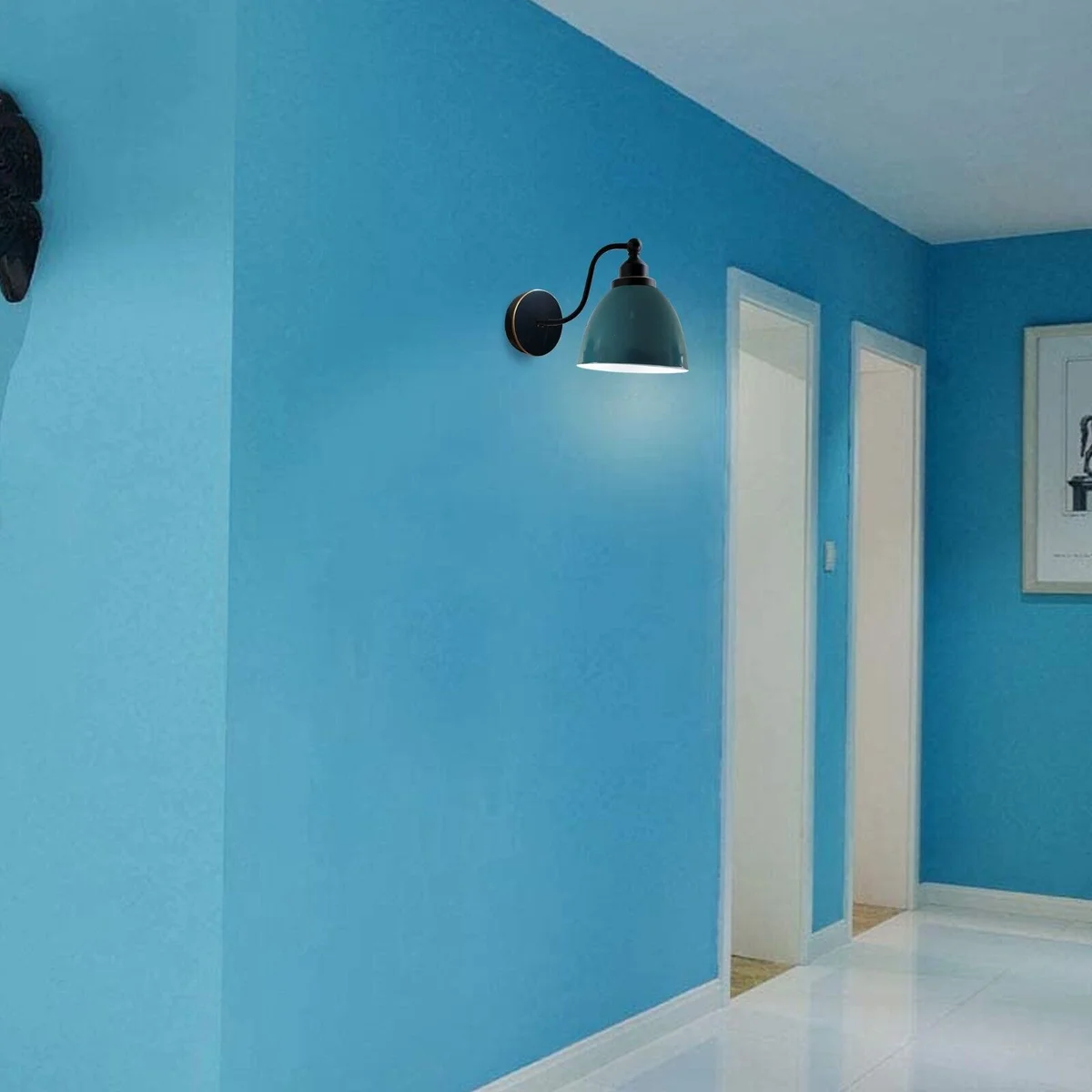Cyan blue wall light with metal arm, modern style sconce, circular metal shade.