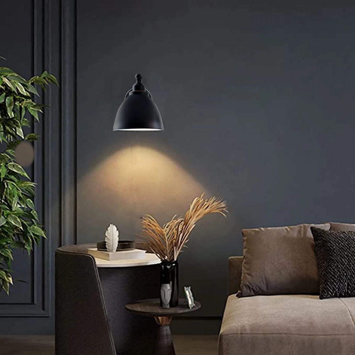 Black modern wall light with swan neck metal arm and oval grey‑tinted shade.