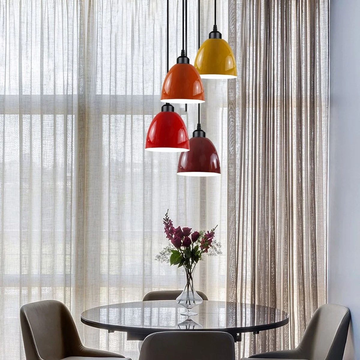 Black retro ceiling light hanging from metal base with PVC cable, four decorative shades.