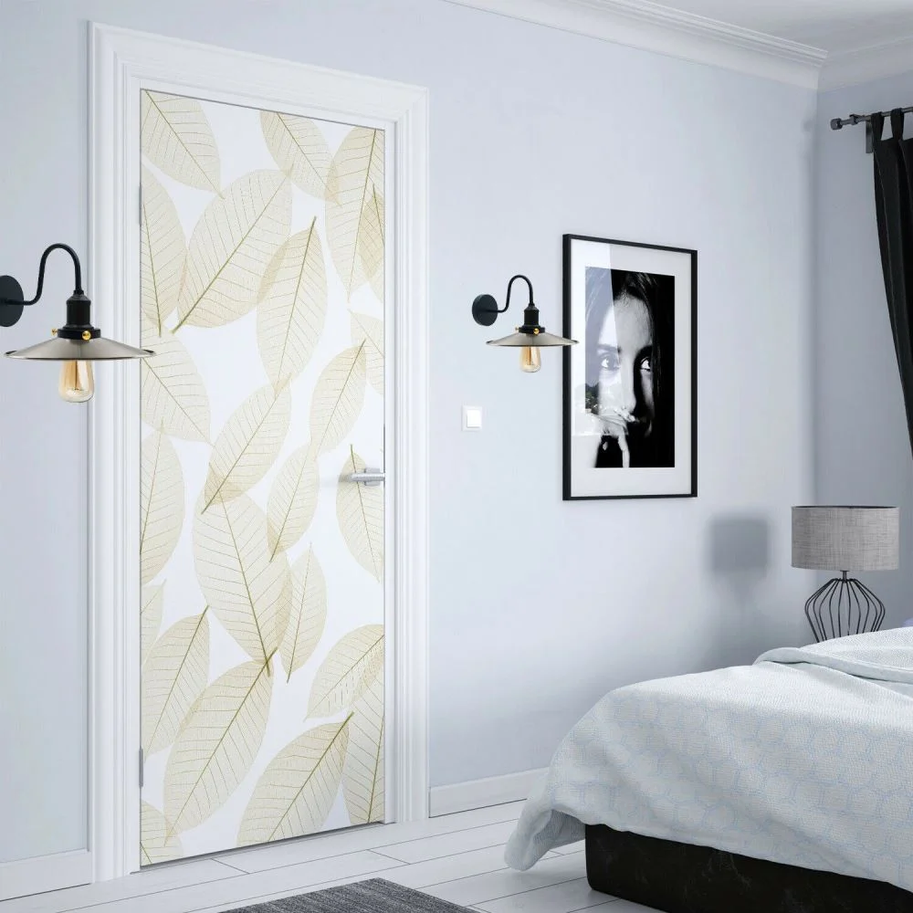 Metal wall lamp featuring a matte finish cone shade, white inside, 22cm wide by 10cm high.