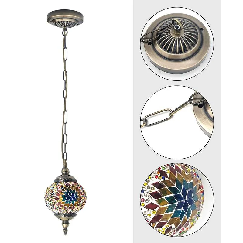 E27 bulb pendant light with 14cm mosaic glass globe on an antique brass chain, showing a colourful kaleidoscope glow.