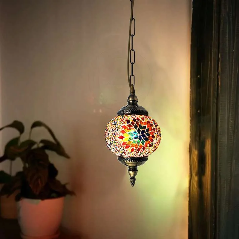 Turkish mosaic pendant light with a 14cm multicolour glass globe hanging from ornate antique brass chain.