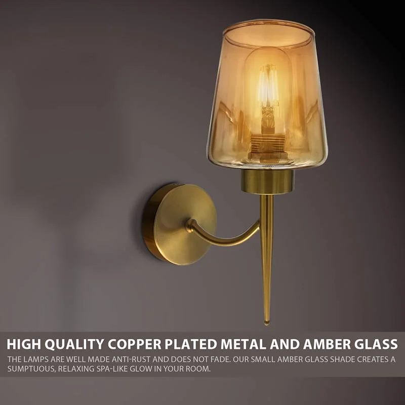 Hardwired wall lamp with amber glass shade, copper plated metal finish, mounted on wall, modern interior lighting