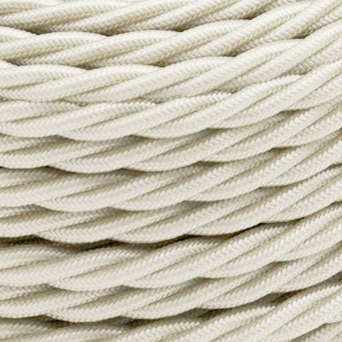 Ivory twisted fabric lamp cord with braided PVC cable, showing flexible 3‑core cable in a vintage style.
