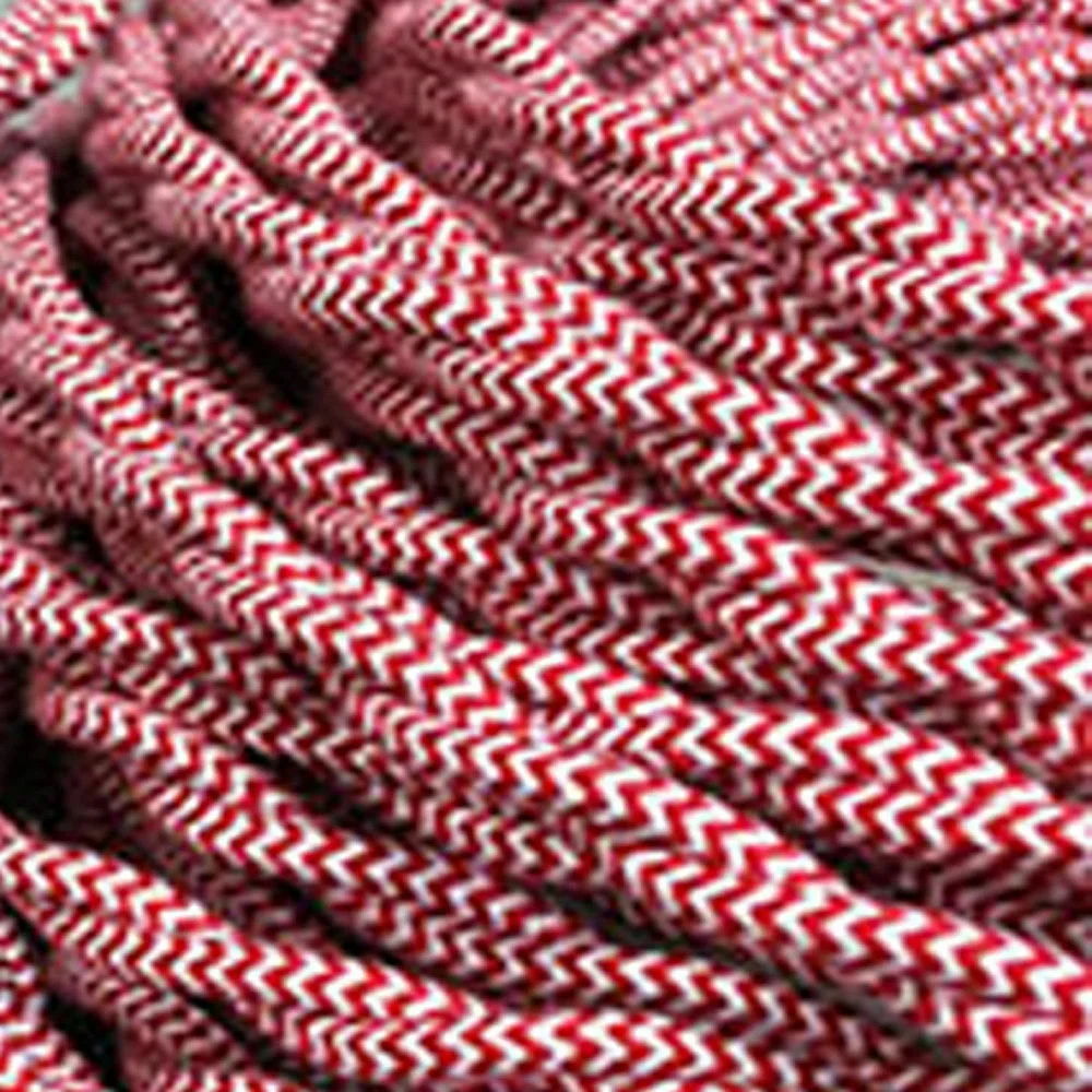 Twisted 3‑core electric cable in red and white woven fabric with vintage style lighting flex for indoor use.