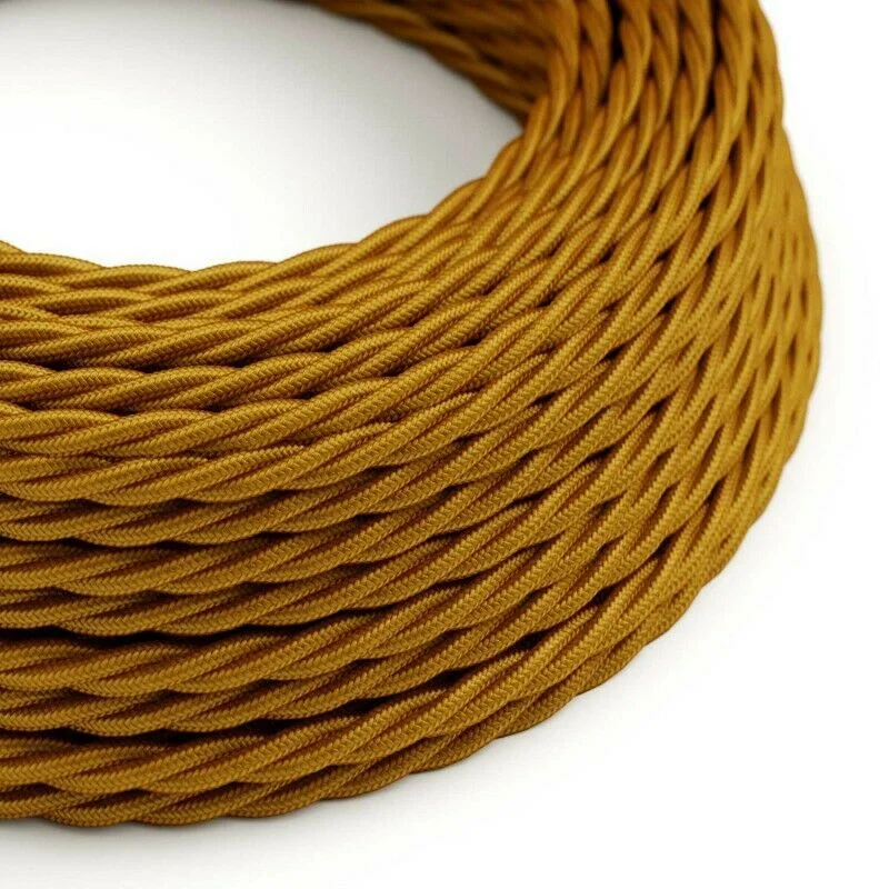Gold vintage twisted fabric cable coil, 3 core, 6mm diameter, displayed on flat surface.