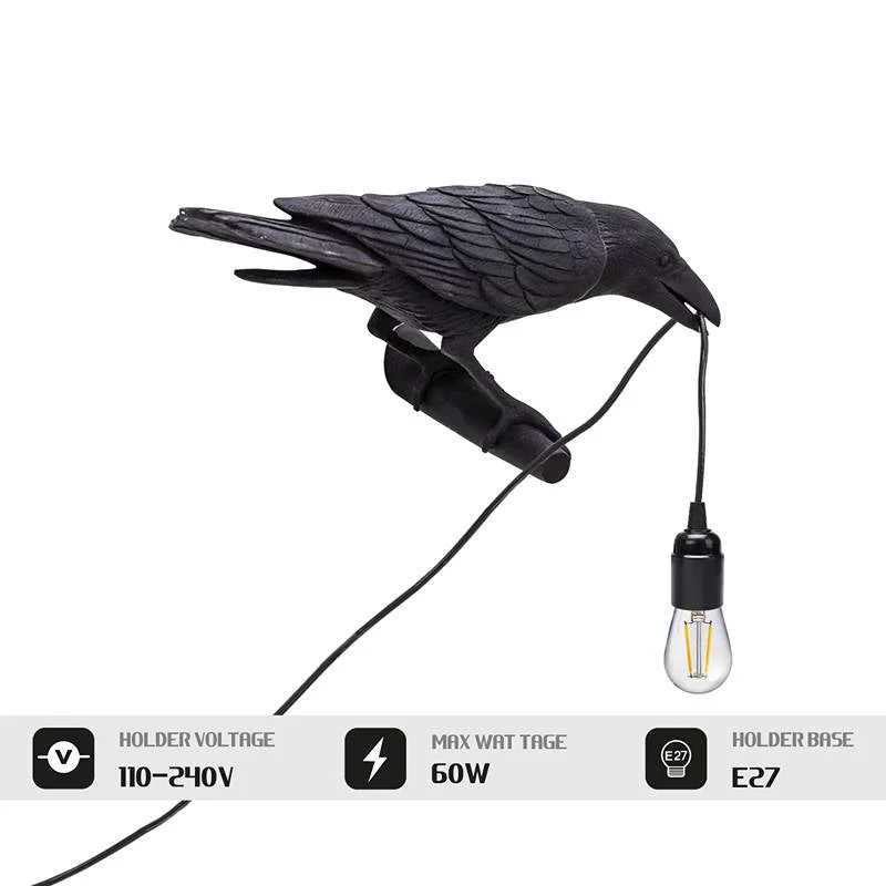 Black resin bird-shaped wall light in modern art deco design, detailed carving, 39cm long
