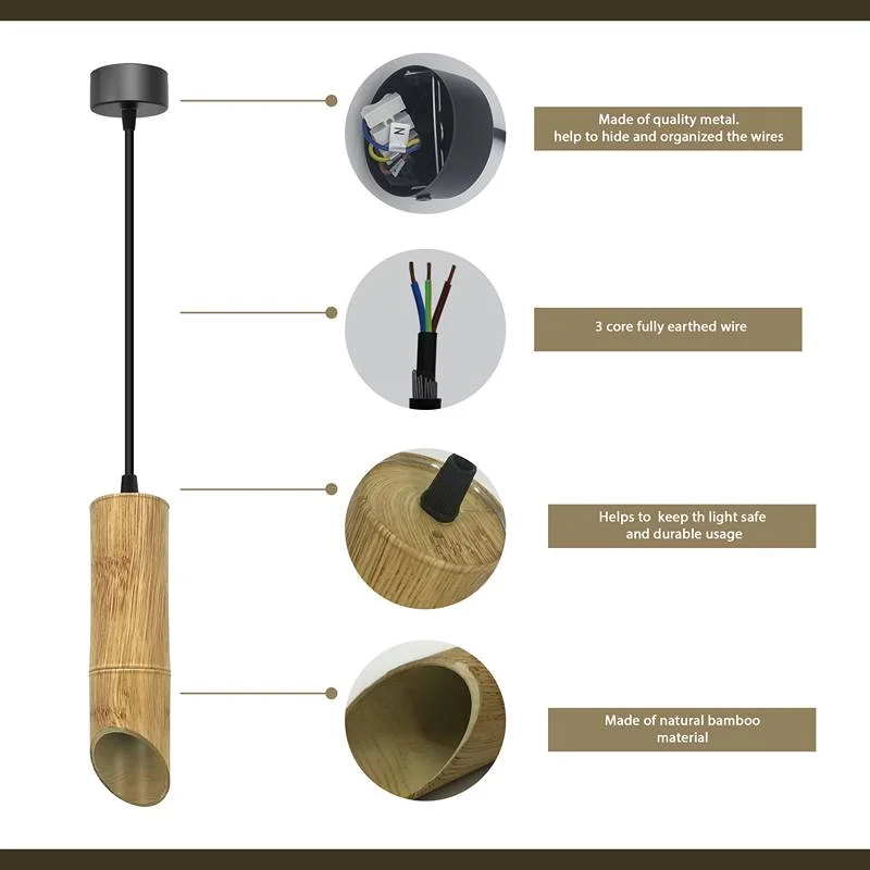 Wooden pendant light hanging from ceiling, long wooden tube with cylindrical aluminium spotlight and adjustable cable.