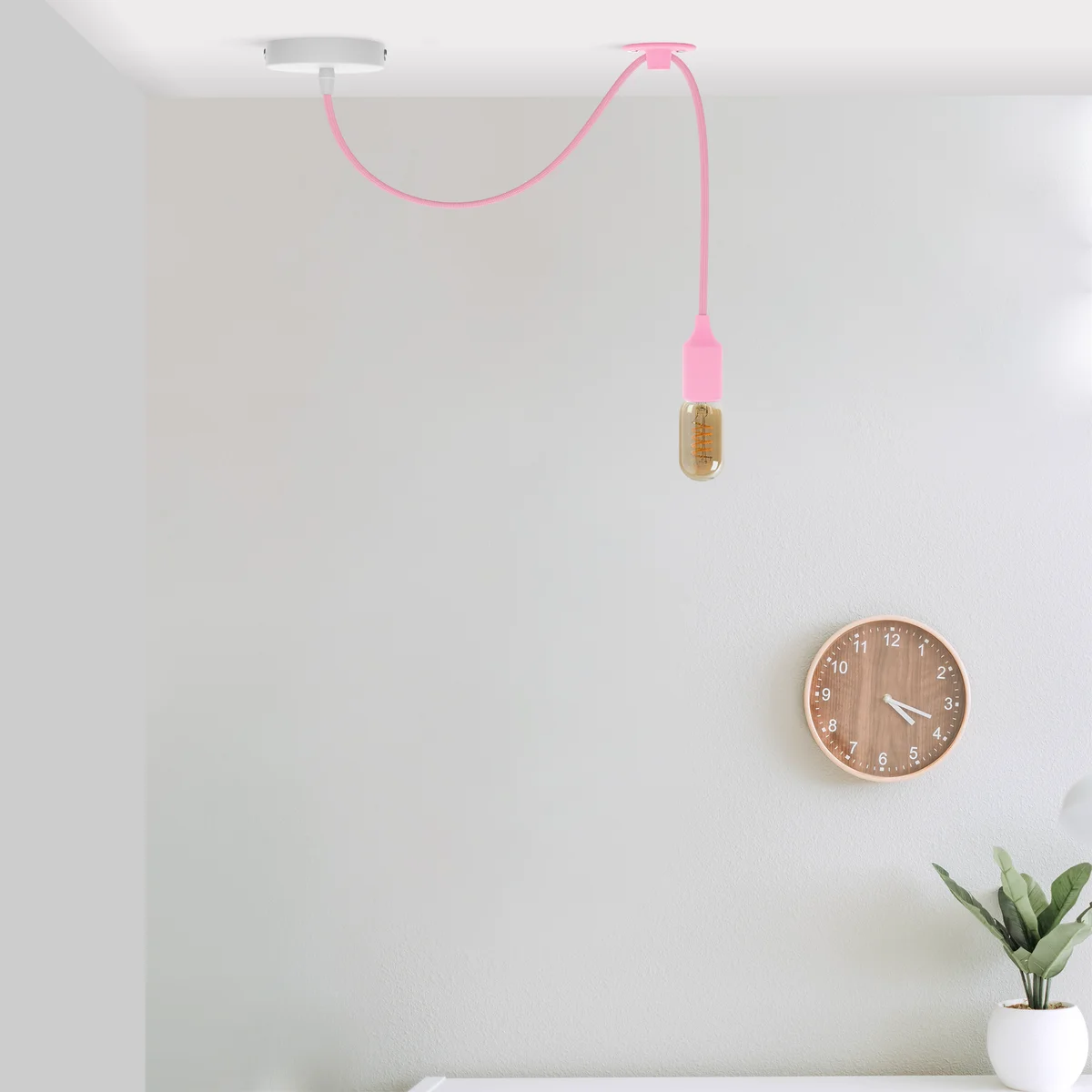Fabric cable pendant with sleek metal holder, adjustable length and classic vintage style.