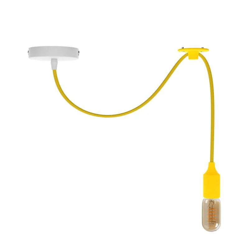 Adjustable pendant light with fabric cable and sleek metal holder, vintage style, suitable for kitchen or nursery.