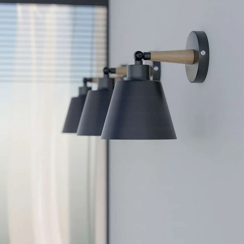 Modern black wall sconce with wooden decorative lampshade, rotatable 180° and black aluminium body.