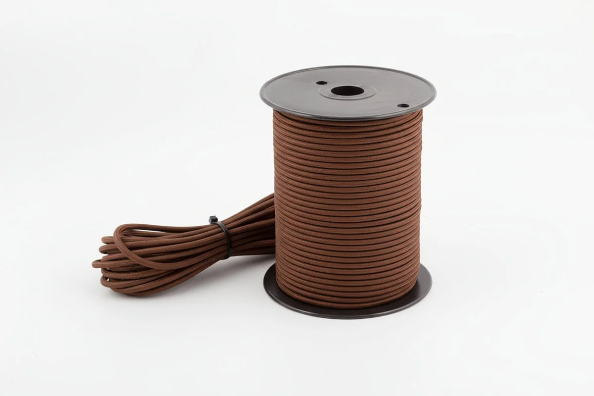 Brown round braided lighting cable with copper conductors, showing a flexible 2‑core fabric cable for indoor pendant lights