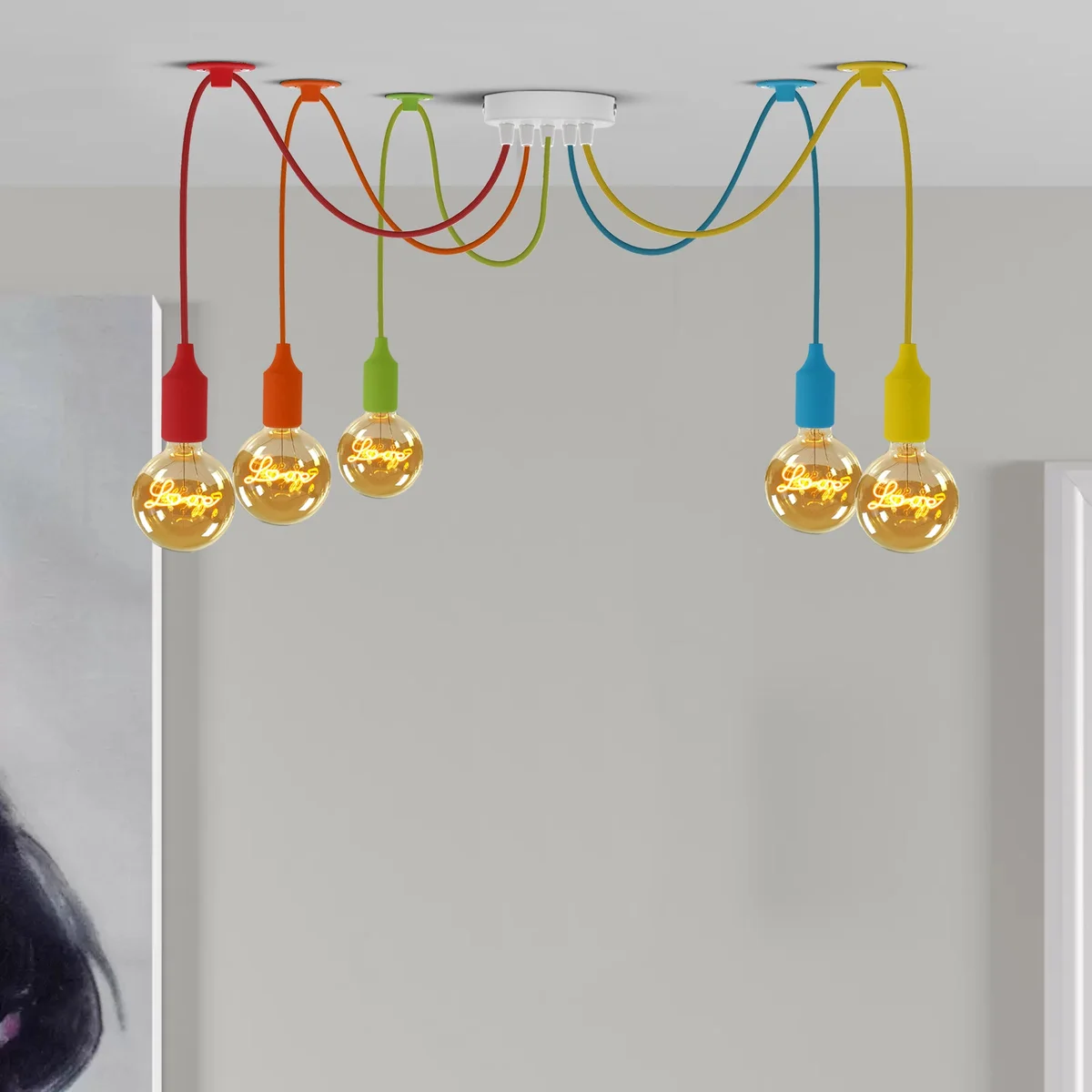 Vintage pendant light with 5 spider‑shaped heads, adjustable multicolour cable, metal and fabric construction.